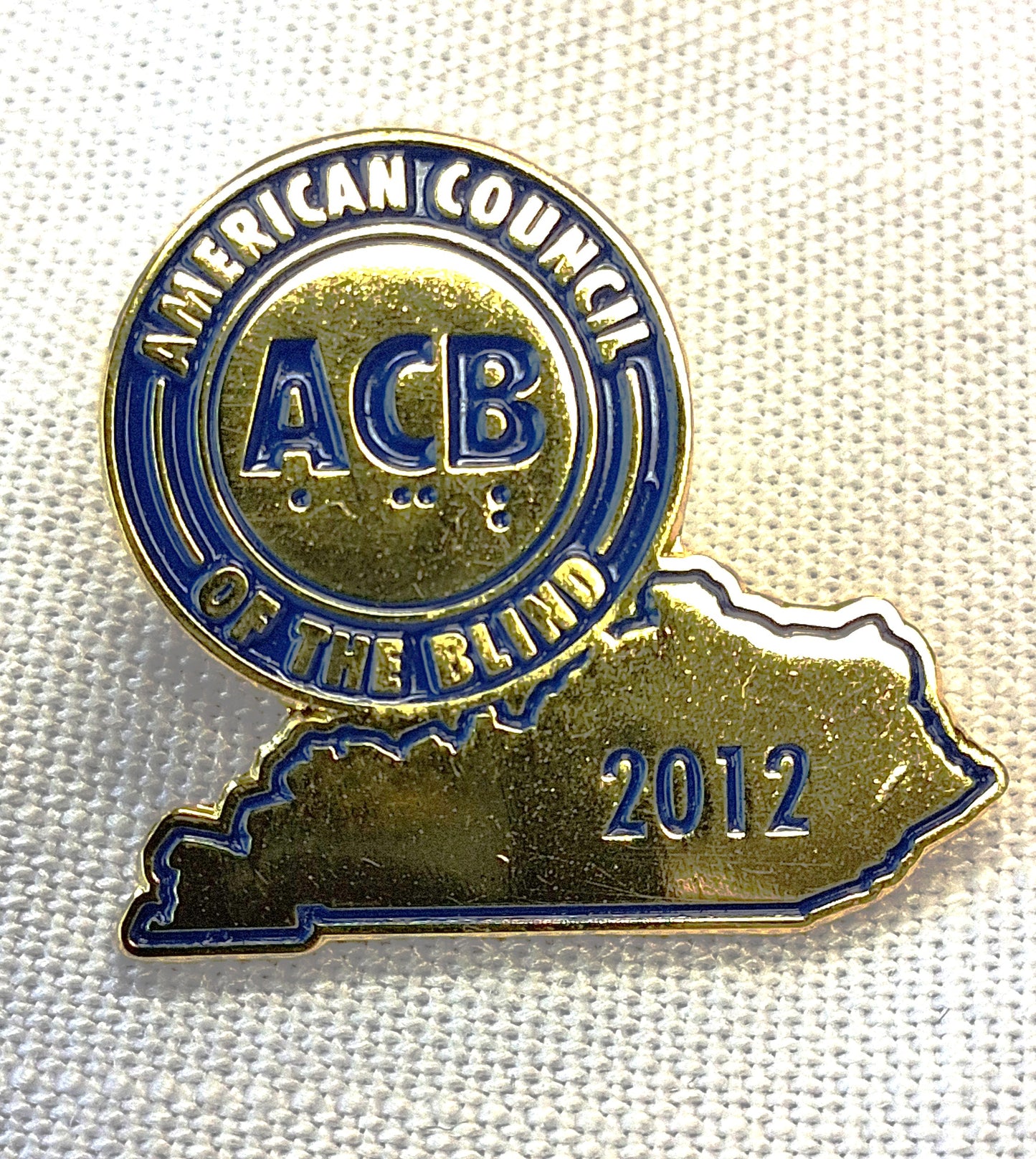 Pin with American Council of the Blind logo and 'ACB' on a white background