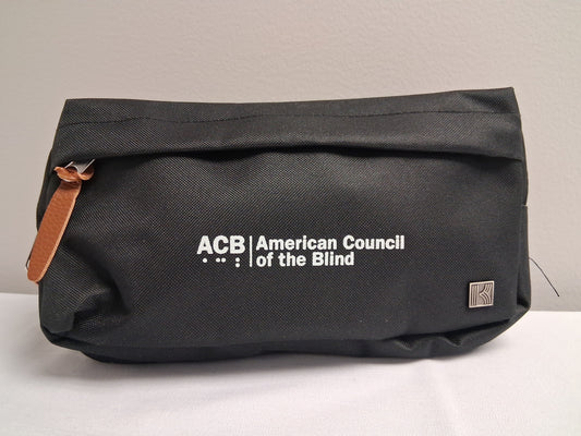 Black fanny pack with American Council of the Blind logo on a light gray background