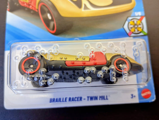 Toy car with 'Barrillte Racer' branding on a clear plastic card.