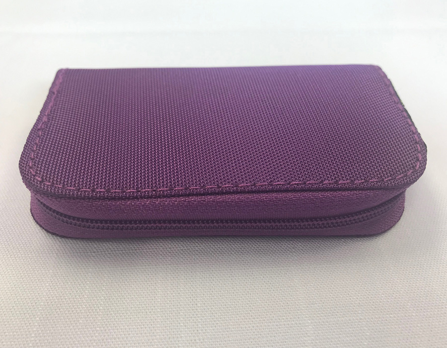 Purple zippered card organizer - closed zipper side view