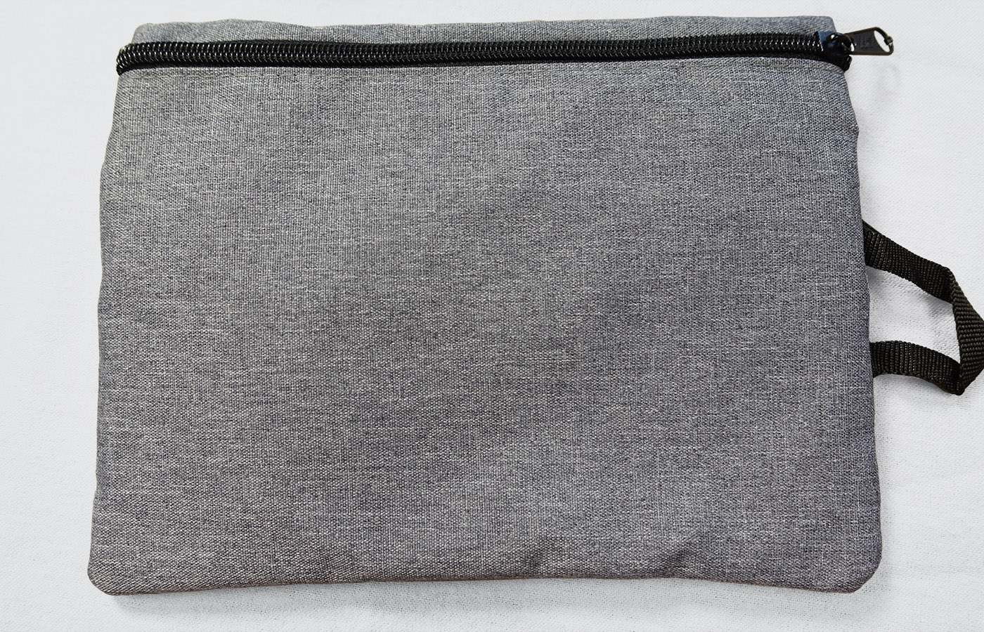Charcoal gray accessory bag - back view