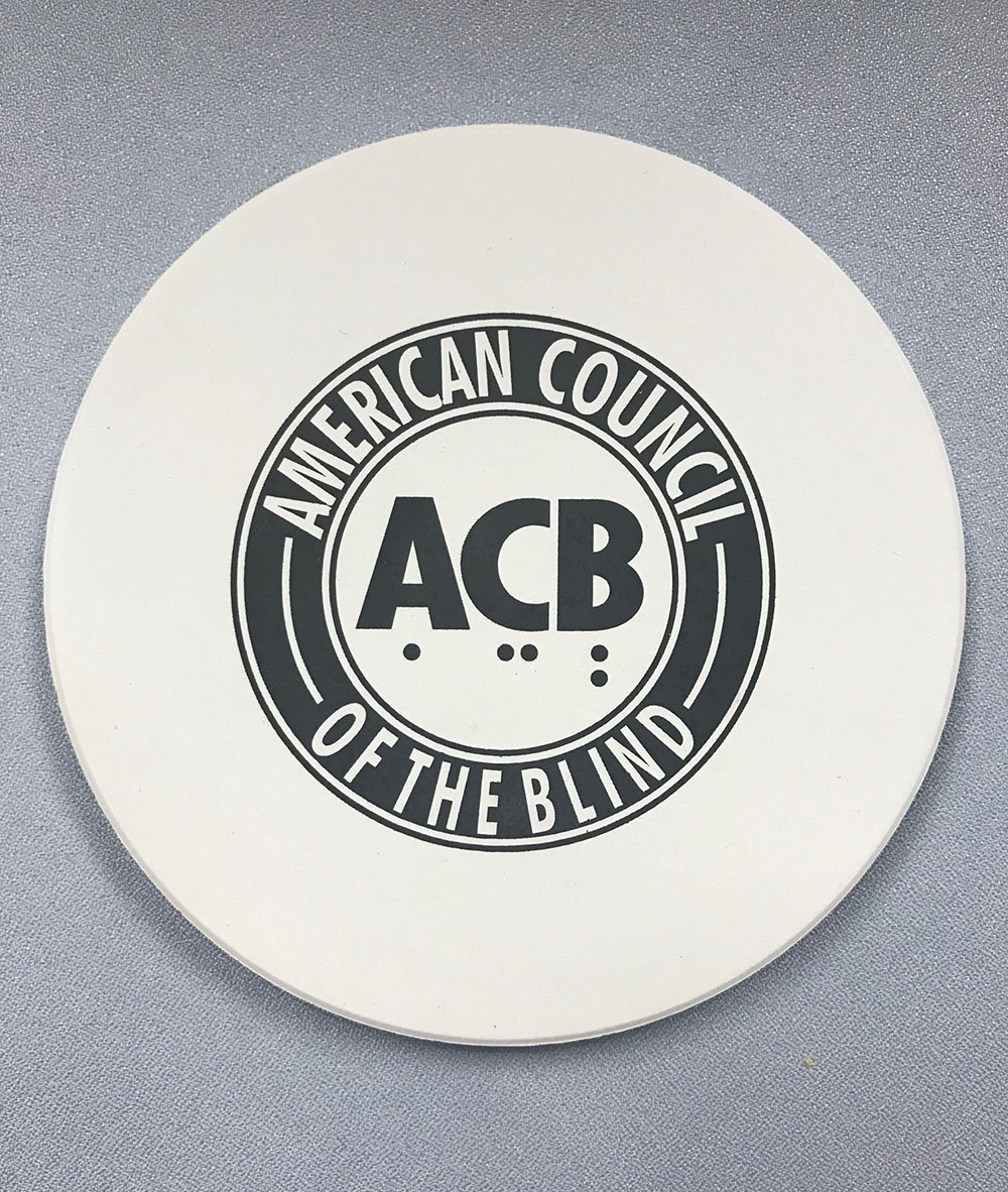 Coaster with ACB Logo - front side view
