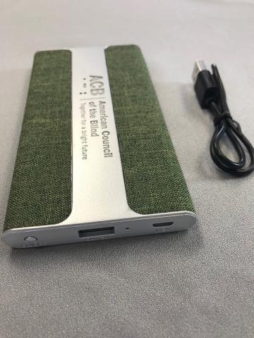 Green power bank with cord - side view