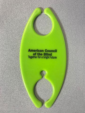 Lime green cord and cable tamer device
