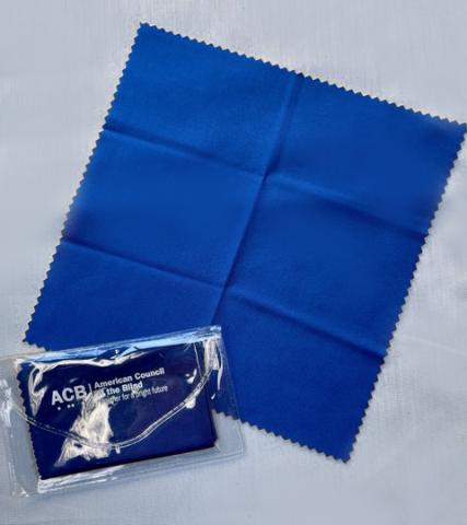Blue microfiber cleaner cloth with clear plastic pouch