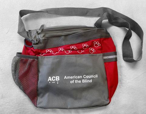 Red and gray pet accessory bag - front side view